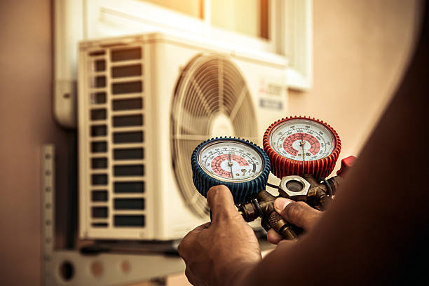 Professional Air Conditioning Service technician working in Grand Saline, TX